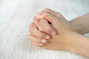 Asian woman's hand gestures are isolated over white background photo