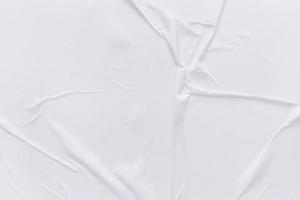 Blank white paper is crumpled texture background. Crumpled paper texture backgrounds for various purposes photo