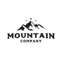 montaña de logotipo vintage con estrella en la parte superior para el logotipo de fotografía de paisaje, logotipo icónico adecuado para empresas relacionadas con la producción de películas vector