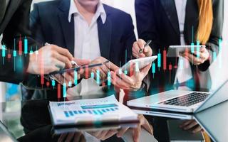 Two stock traiders making analysis of digital market and investment in block chain crypto currency. photo