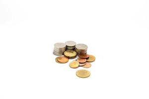 Stack of coins on white background. photo