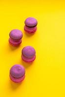 Bright colorful macaroons background. Sweet food stylish flat lay wallpaper. photo