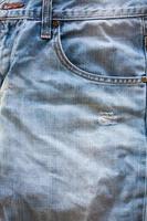 Close up of blue jeans photo