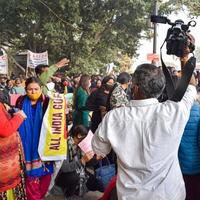 New Delhi, India December 25 2021 - Delhi Contractual Guest Teachers with posters, flags and graffiti protesting against Delhi AAP Government for making policy, Delhi Guest Teachers protesting photo