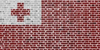 Flag of Tonga painted on a brick wall photo