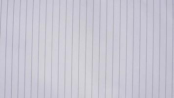 white sheet of paper. Lined notebook paper for background photo