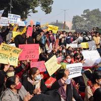 New Delhi, India December 25 2021 - Delhi Contractual Guest Teachers with posters, flags and graffitis protesting against Delhi AAP Government for making policy, Delhi Guest Teachers protesting photo