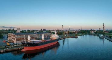 Aerial view of the port and wharf in Riga Latvia with huge tankers docked. photo