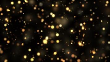 partículas de movimiento de oro en movimiento de bucle sobre fondo negro video
