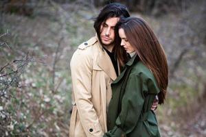 Beautiful sensual portrait of young stylish couple in love.Image of adorable brunette couple in love. Happy family.