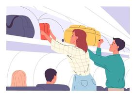 Passengers putting their hand luggage into overhead locker on aircraft vector