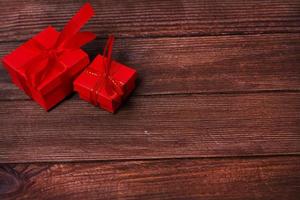 Gift boxes on wooden table. Collection of gift boxes on wooden board holidays concept. Presents for any holiday concept. photo