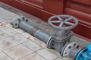 Industrial water valve on floor photo