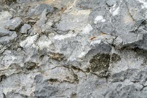 Closeup rock pattern with hole in nature photo
