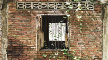 Window of an old abandoned house. Scary. Scary place concept. photo