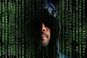 Hacker concept. Hacker Hood is a dangerous hacking and malware and computer virus. Identity theft and cybersecurity photo