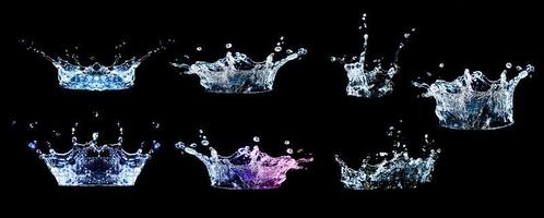 Collection of splashing water on a black background photo