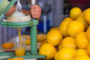 Grapefruit juice made from street hawker photo