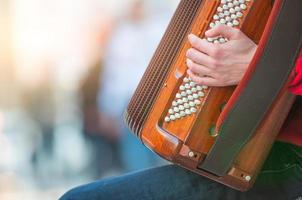 Accordion player in the street photo