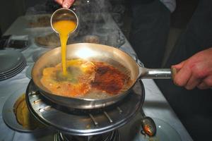 Preparation of Omelettes at a party banquet photo