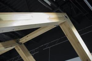 Wooden beams in construction. Details of furniture made of boards. photo