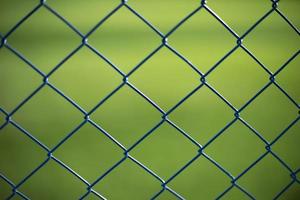 Fence net. Fence on green background.