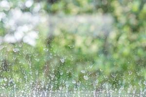 Close up dry water stains on the glass window. photo