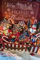 Home for the Holidays box full of Christmas decorations photo