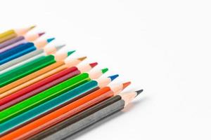 Set of colored pencils on white background. Back to school concept. Place for text.