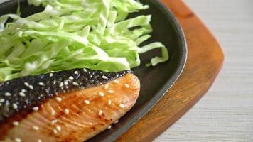 grilled salmon fillet steak on hot plate in Japanese style video