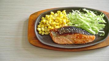 grilled salmon fillet steak on hot plate in Japanese style video