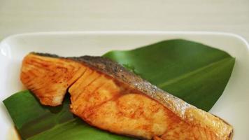 Grilled Salmon Steak with Soy Sauce on plate - Japanese food style video