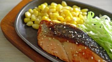 grilled salmon fillet steak on hot plate in Japanese style video