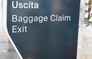 uscita baggage claim exit photo