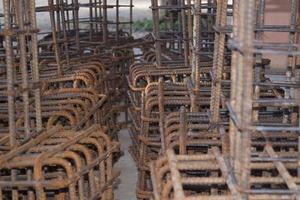 Deformed steel bars that are bending and bound to give the shape and structure to be suitable for the construction of houses, buildings that require strong, durable, firm ground of the building photo