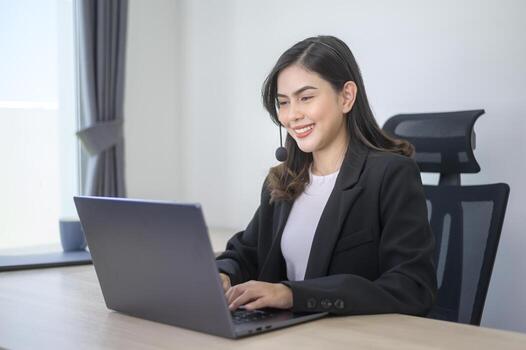 Female call center agent with headset consulting clients online, customer service and customer support operator concept photo