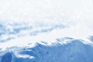 antecedentes. paisaje de invierno la textura de la nieve foto