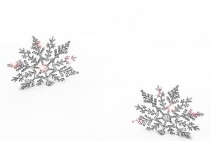 White fluffy snowflakes on snow. Winter christmas background. photo