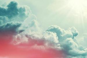 Blurred background. Blue sky and white fluffy clouds. photo