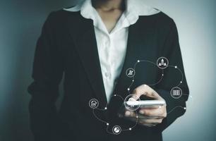 Concept global data connection with internet technology, user touch screen for online transactions by internet technology, big data, database management, cloud computing, cashless society. photo