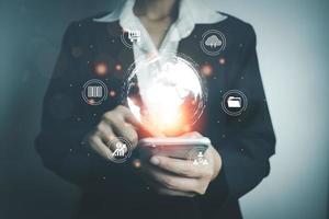 Concept global data connection with internet technology, user using smartphone for online transactions by internet technology, big data, database management, cloud computing, cashless society. photo