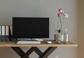 maqueta de pared con mesa en la sala de estar con una pared blanca sala de estar moderna con monitor. mesa de muebles de diseño interior escandinavo y plantas con paredes blancas. copie el espacio representación 3d foto