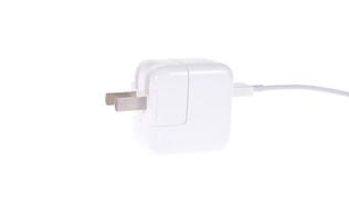 Electrical adapter to USB port on a white background photo