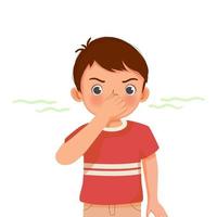 cute little boy pinching and cover his nose smelling something stinky and bad aroma holding breath with fingers on nose vector