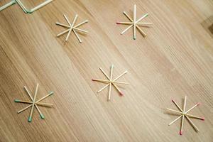 Star match on wood floor. photo