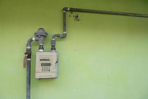residential gas meter and pressure regulator, distribution of natural gas to people's homes for those who subscribe photo