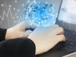 Business man is typing keyboard computer working with his worldwide business, internet financial technology fintech concept.ter photo