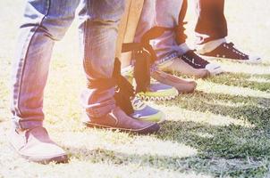 Five legged race outdoor party game, harmonious unity concept photo