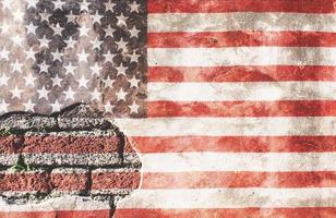 USA flag overlay on old granite brick and cement wall texture for background use photo