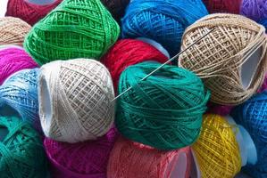 Bright colored yarn balls background photo